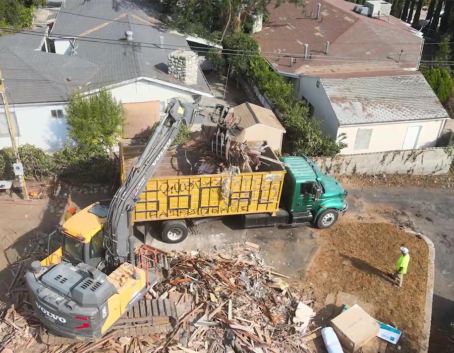 charging an heavy truck with rest after a fire damage demolition process